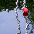 Red Balloon floating on Dublin's River Liffey