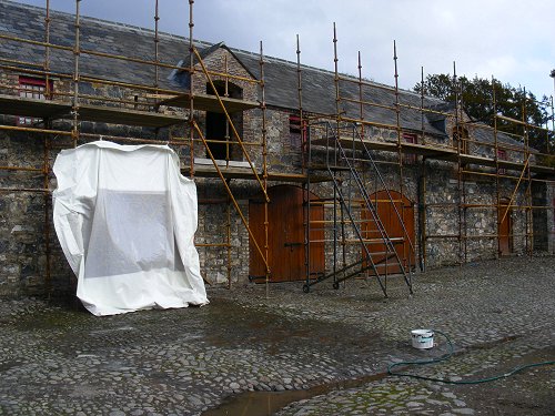 hanging the roof of my art tent from the scaffolding to wash it